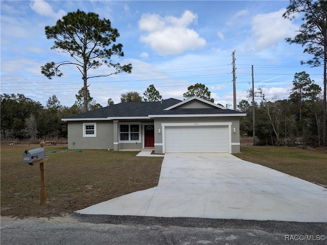 ranch-style house with a garage and a front lawn