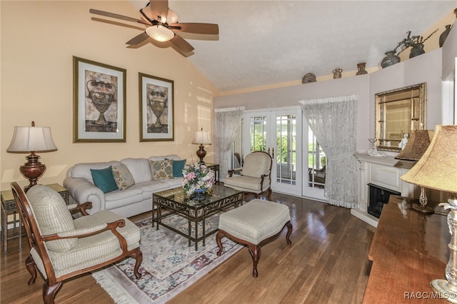 living room with ceiling fan, french doors, dark hardwood / wood-style floors, and lofted ceiling