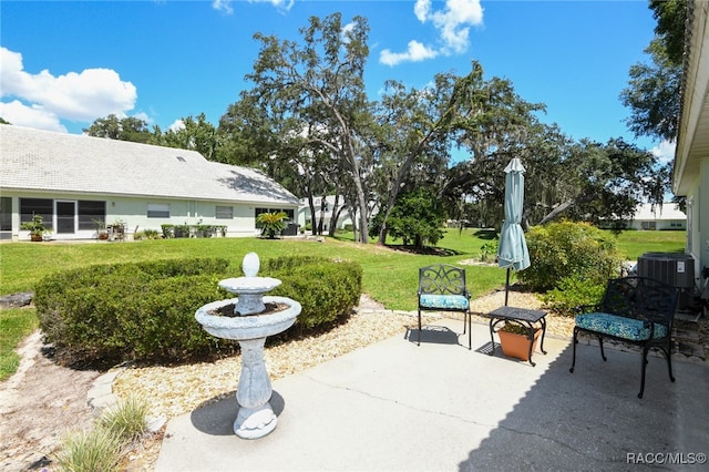 view of patio with central AC