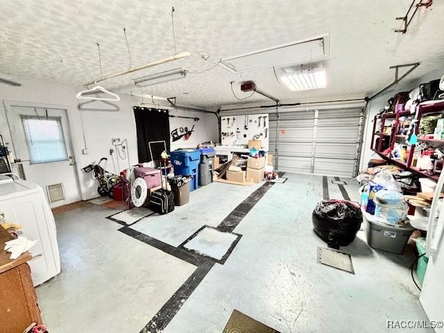 garage featuring washer / dryer
