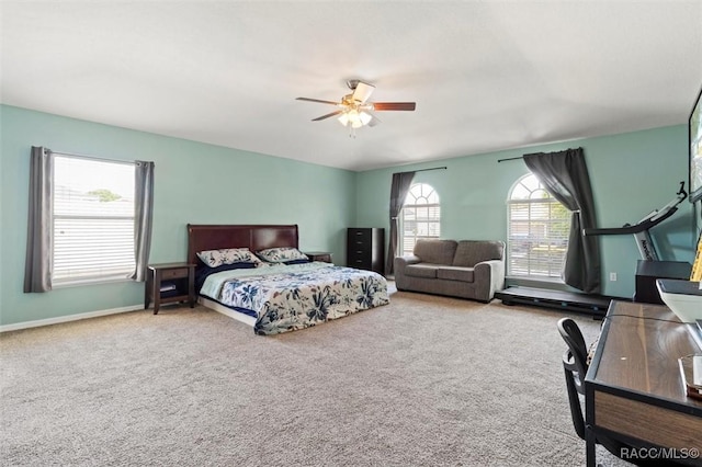 bedroom featuring a ceiling fan, carpet floors, and baseboards