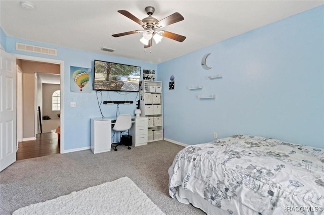 bedroom featuring visible vents, baseboards, and carpet floors