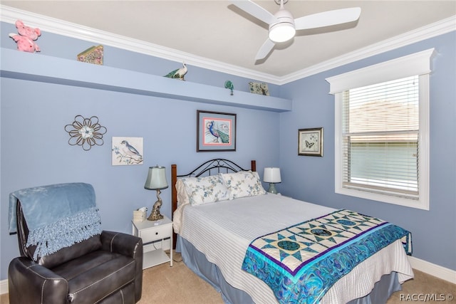 bedroom with carpet flooring, ceiling fan, and crown molding