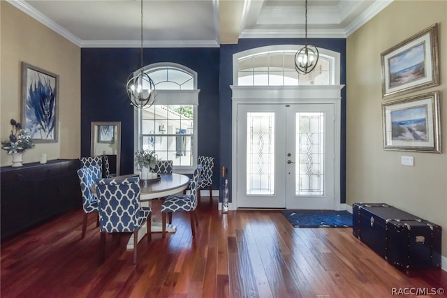 entrance foyer featuring french doors, crown molding, an inviting chandelier, beamed ceiling, and dark hardwood / wood-style floors