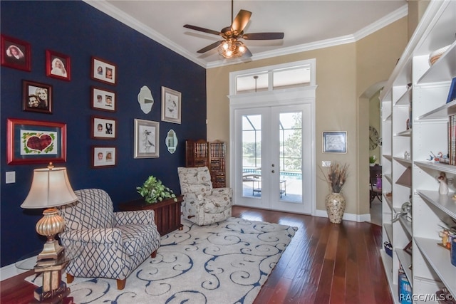 sitting room with crown molding, french doors, ceiling fan, and hardwood / wood-style floors