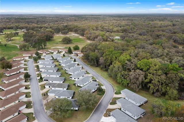 aerial view with a forest view and a residential view