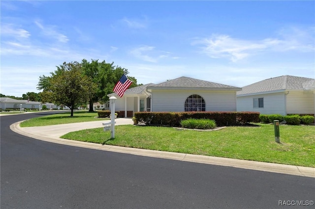 13618 SW 111th Cir, Dunnellon, FL 34432 - view of front of house with a front lawn and driveway