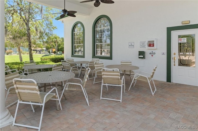 13618 SW 111th Cir, Dunnellon, FL 34432 - view of patio / terrace with ceiling fan and outdoor dining area