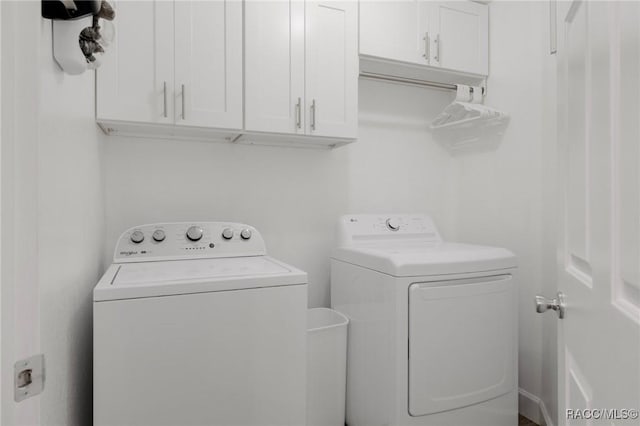 13618 SW 111th Cir, Dunnellon, FL 34432 - laundry room with washing machine and dryer and cabinet space
