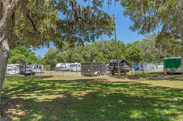 13618 SW 111th Cir, Dunnellon, FL 34432 - view of yard with view of wooded area