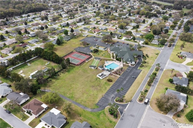 13618 SW 111th Cir, Dunnellon, FL 34432 - aerial view of property and surrounding area featuring nearby suburban area and a pool area