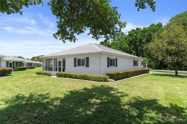 13618 SW 111th Cir, Dunnellon, FL 34432 - view of home's exterior with a yard