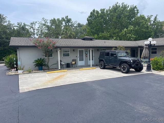 1412 SE Paradise Ave Unit 2, Crystal River, FL 34429 - ranch-style house with uncovered parking, stucco siding, and covered porch