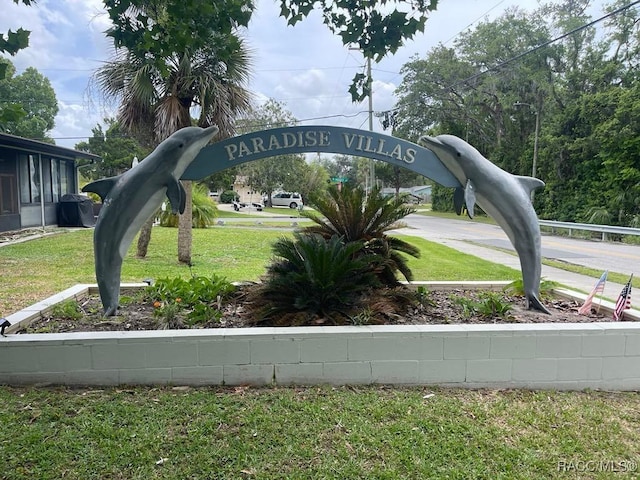 1412 SE Paradise Ave Unit 2, Crystal River, FL 34429 - community / neighborhood sign with a yard