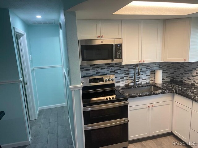 1412 SE Paradise Ave Unit 2, Crystal River, FL 34429 - dock area with a water view and a boat ramp