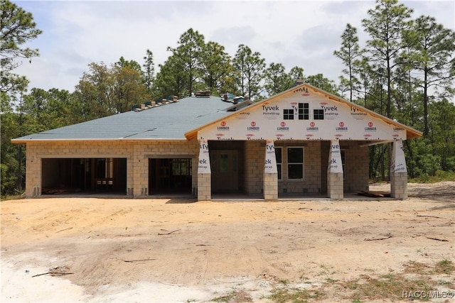 property under construction with a garage and a porch