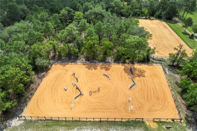 birds eye view of property featuring a rural view