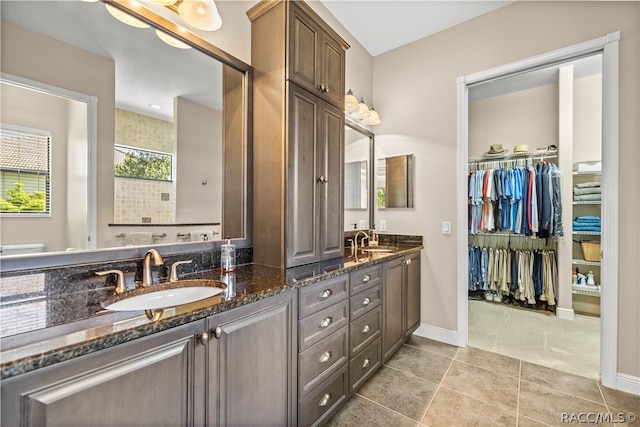 bathroom with vanity and tile patterned floors