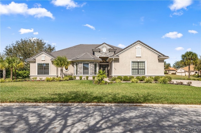 view of front of house with a front lawn