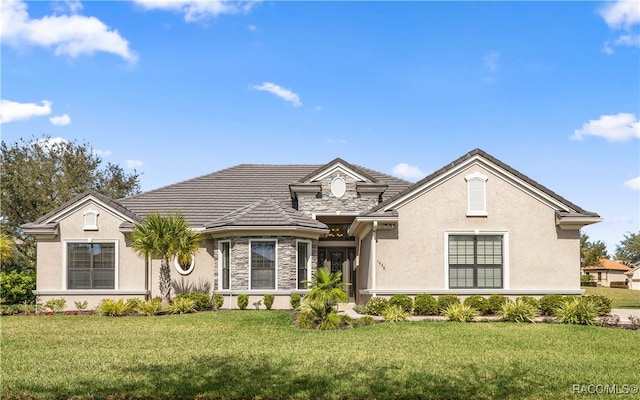 view of front of home with a front yard