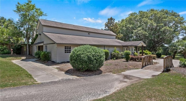 view of home's exterior featuring a yard