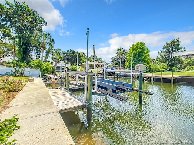 view of dock with a water view