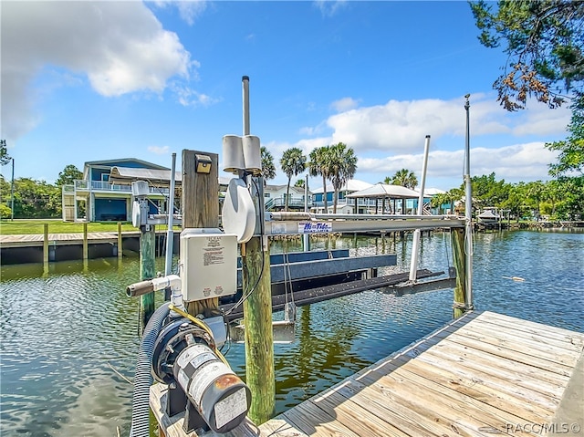 dock area featuring a water view