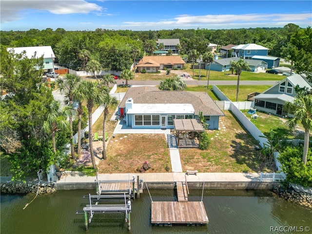 drone / aerial view with a water view