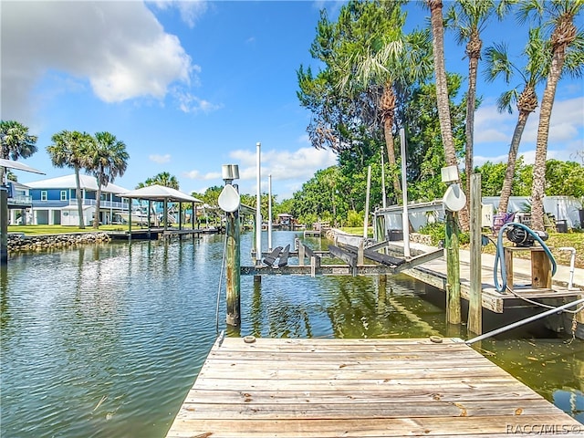 view of dock featuring a water view