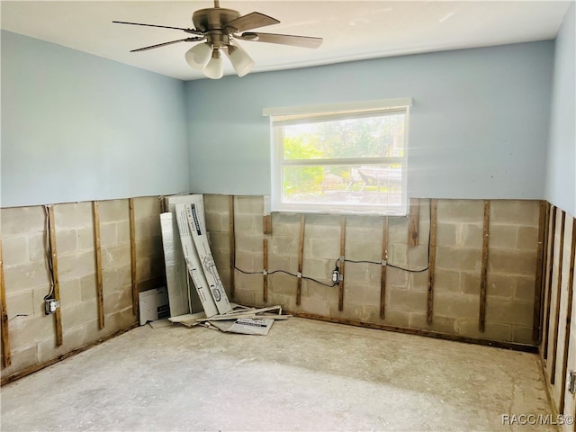 interior space featuring ceiling fan