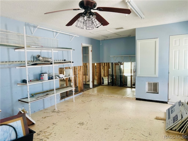 interior space featuring ceiling fan