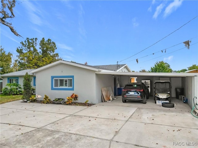 view of front of house featuring a carport