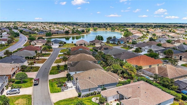 aerial view with a residential view and a water view