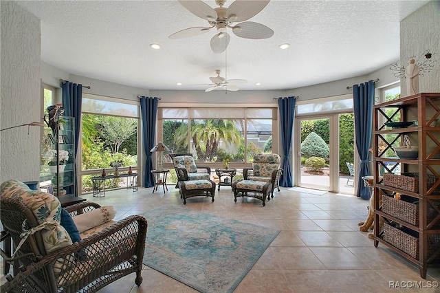 sitting room featuring recessed lighting, a textured ceiling, ceiling fan, and tile patterned flooring