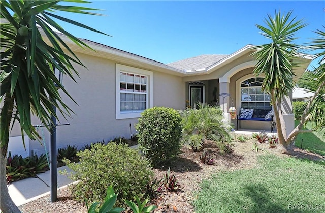 2101 N Brentwood Cir, Lecanto, FL 34461 - view of side of home with stucco siding