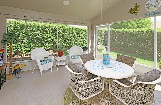 2101 N Brentwood Cir, Lecanto, FL 34461 - sunroom / solarium with plenty of natural light, outdoor dining area, and lofted ceiling