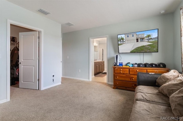 living room featuring light carpet, visible vents, and baseboards