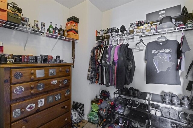 bedroom featuring carpet flooring and ceiling fan