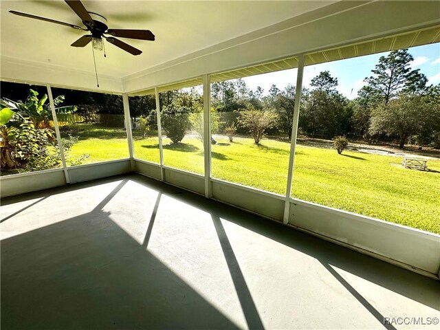 3150 W Mustang Blvd, Beverly Hills, FL 34465 - unfurnished sunroom with a ceiling fan