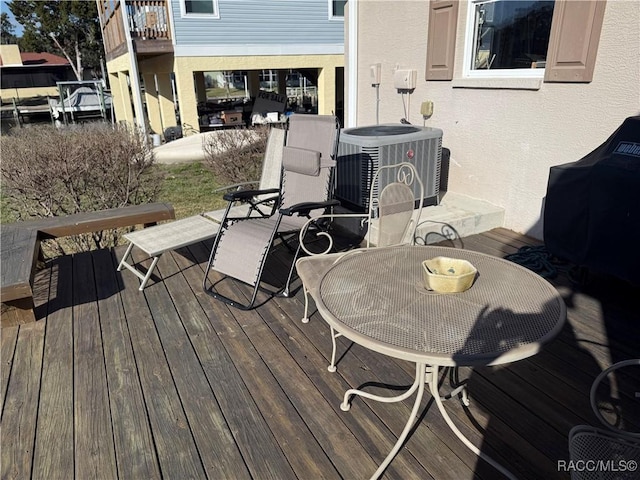 wooden terrace with cooling unit