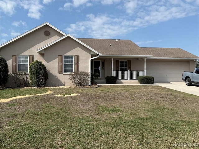 single story home featuring a garage, a front yard, and a porch