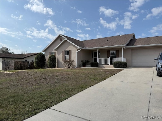 ranch-style home with a garage, a front yard, and a porch