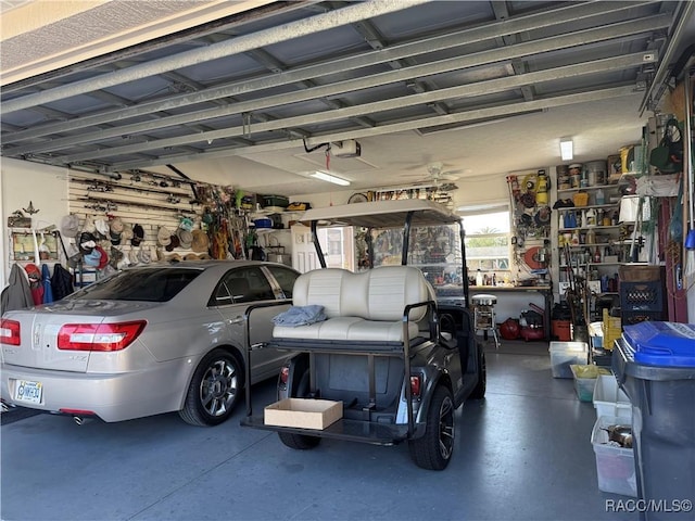 garage featuring a garage door opener