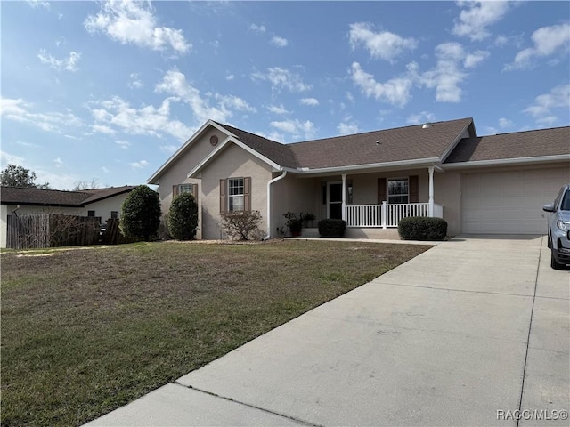3926 N Eagle Pt, Crystal River, FL 34428 - single story home with a porch, a garage, concrete driveway, a front lawn, and stucco siding