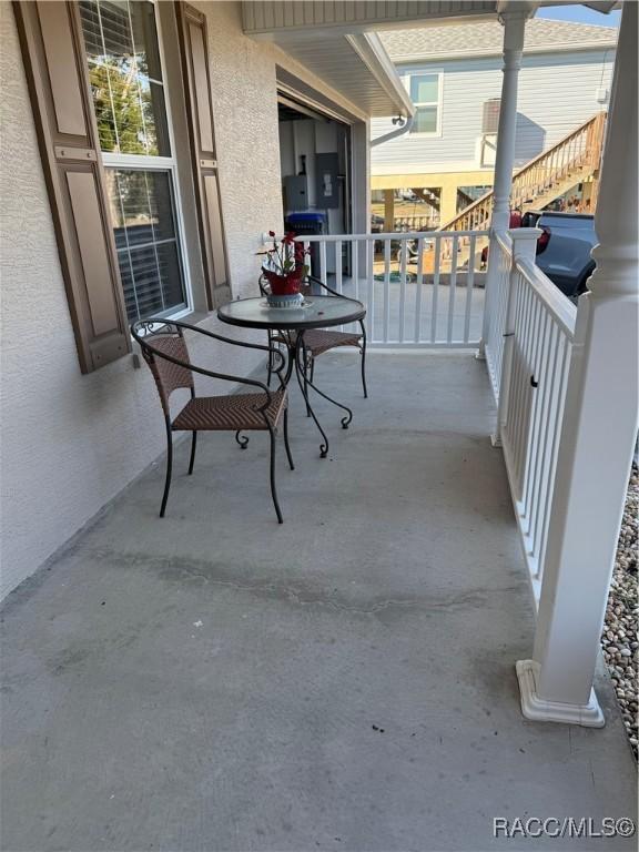 balcony featuring a porch