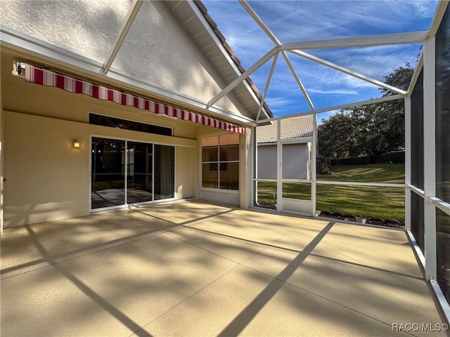 unfurnished sunroom with lofted ceiling