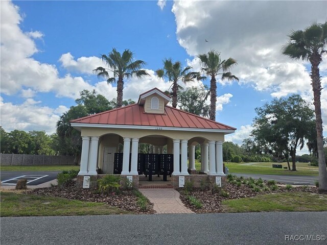 1280 Heron Point Dr, Inverness, FL 34453 - surrounding community featuring mail area and fence