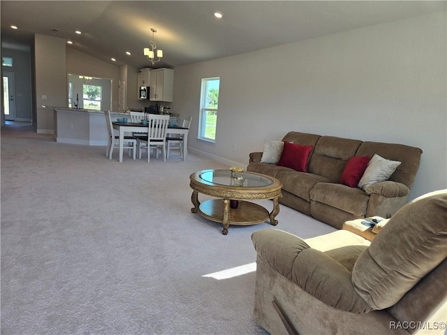 1280 Heron Point Dr, Inverness, FL 34453 - living area with light carpet, vaulted ceiling, baseboards, and recessed lighting