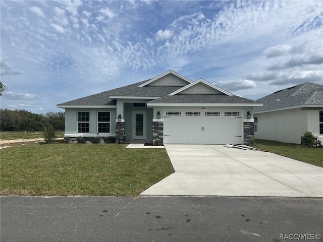 1280 Heron Point Dr, Inverness, FL 34453 - view of front of property featuring stucco siding, driveway, stone siding, a front yard, and a garage