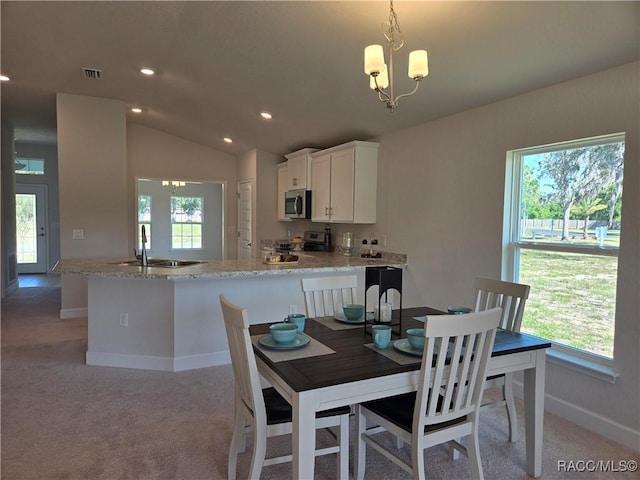 1280 Heron Point Dr, Inverness, FL 34453 - dining area featuring baseboards, visible vents, and plenty of natural light